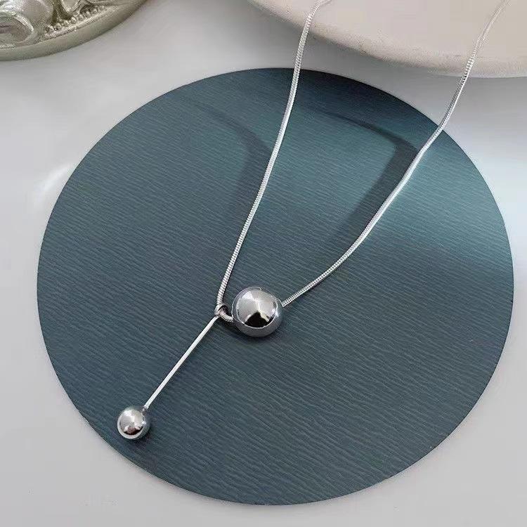 

New high-end round ball pendant necklace women s light luxury niche fringed collarbone chain snake bone chain jewelry light luxury niche срібний