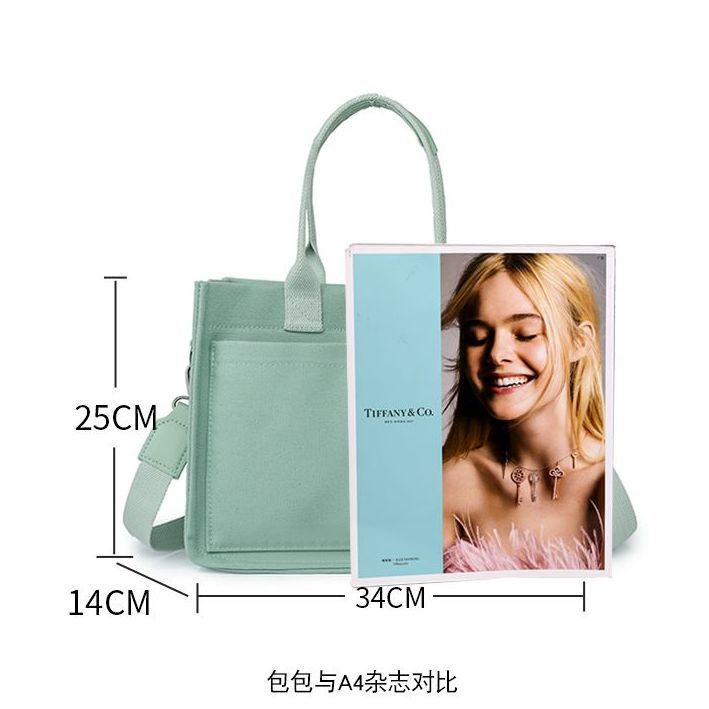 Canvas bag women's large-capacity multi-pocket shoulder bag lady hand-held tote bag