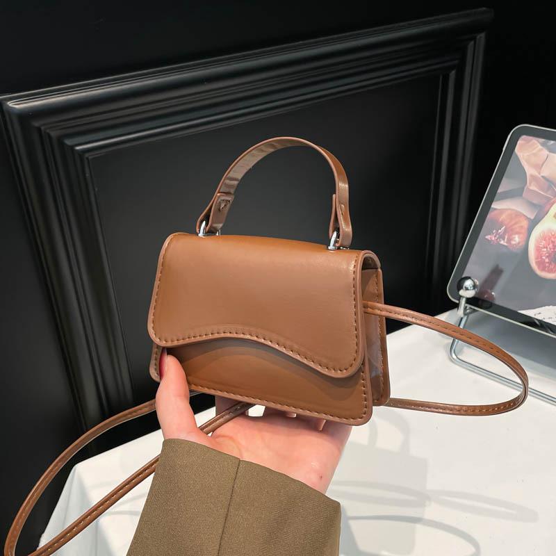 Solid color candy color fashionable retro small square bag women's niche design versatile personality casual senior messenger bag