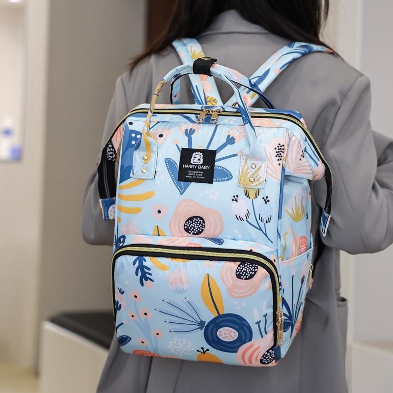 Large-capacity, fashionable, and lightweight printed tote bag for baby bottles, a multi-functional backpack for storing baby essentials, perfect for