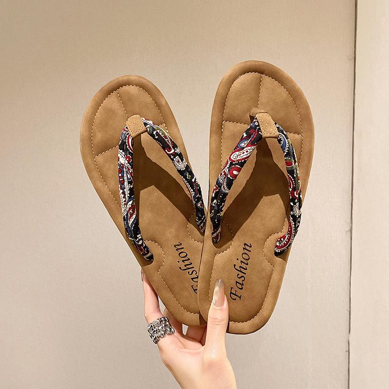 

2025 летняя женская одежда для отдыха на море, новые шлепанцы на плоской подошве с мелким цветочным принтом, нескользящие пляжные сандалии 40 чёрный