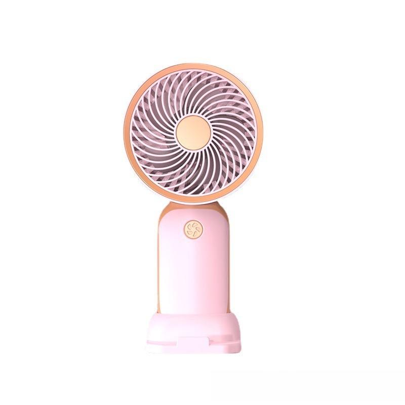 

Новий простий міні-вентилятор із док-станцією Портативна підставка для портативної машини Xuanjin, ручна зарядка через USB. Міні-маленький вентилятор рожевий
