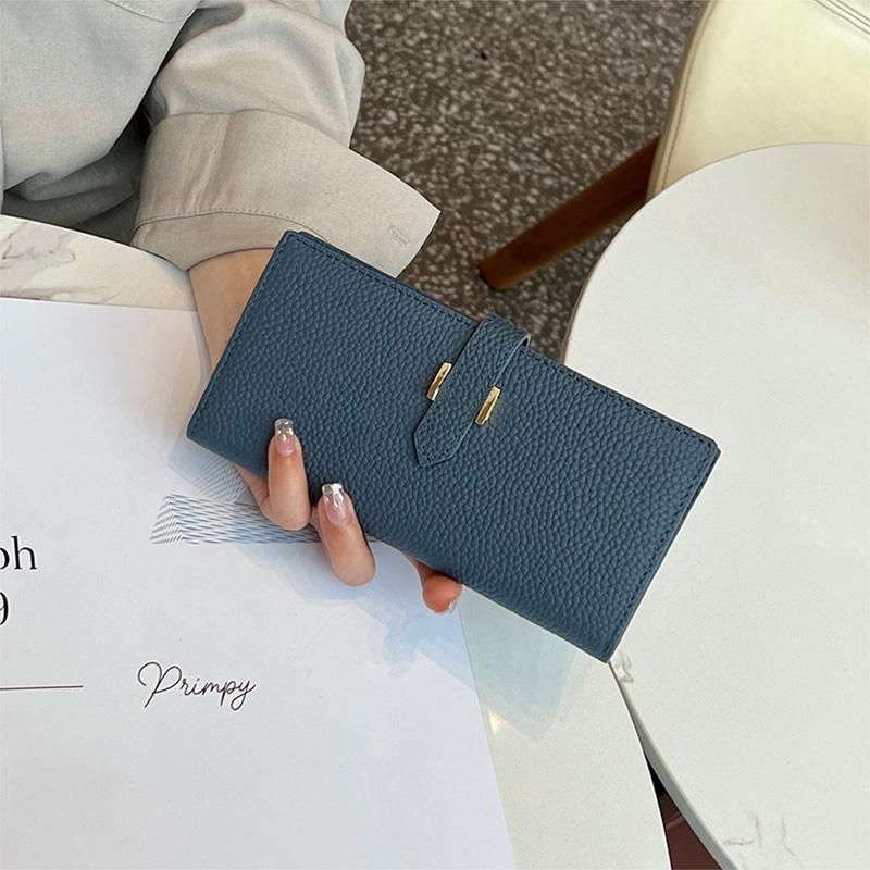 

2025 Натуральная кожа Женские кошельки Первый слой коровьей кожи Длинный кошелек H Hasp Клатчи для женщин Bifold Бумажник без логотипа темно-синий