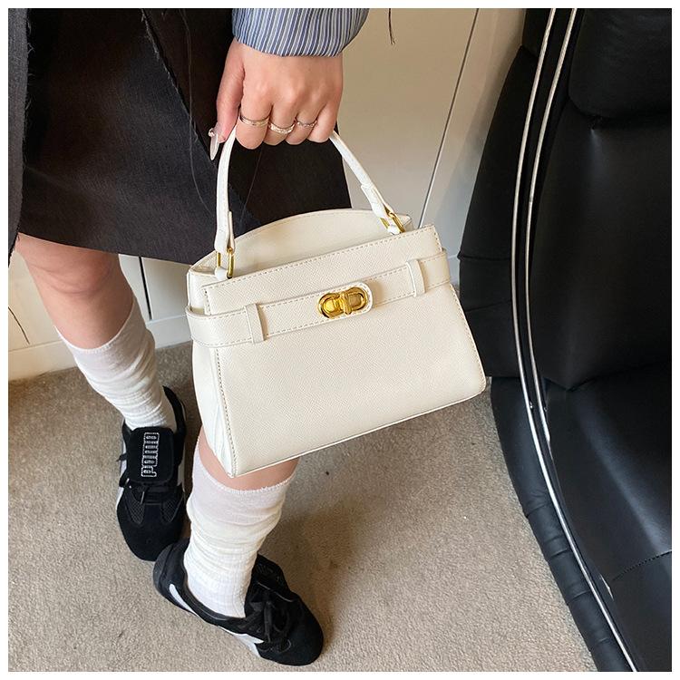 

Versatile elegant bag portable Kelly bag women s 2025 spring and summer new high-end niche one-shoulder messenger bag білий