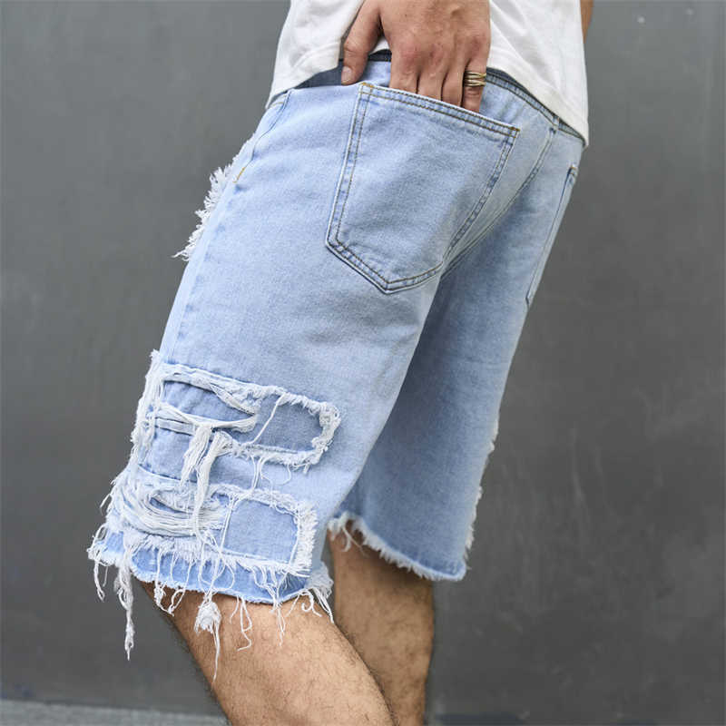 2024 Neue Herrenjeans Europäische und amerikanische zerrissene lockere Herrenshorts Freizeitshorts Fünfviertelhosen