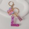 Purple Iridescent Resin Letter Keychain with Butterfly Tassel