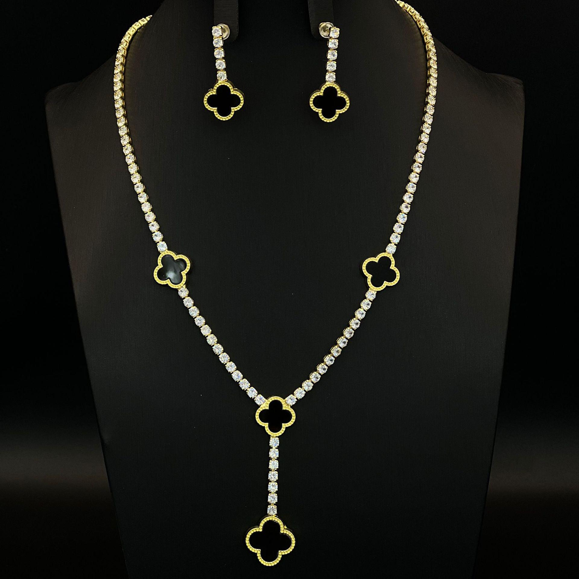 

Four-Leaf Clover Diamond Claw Chain Earrings & Necklace Set – Trendy European & American Luxury