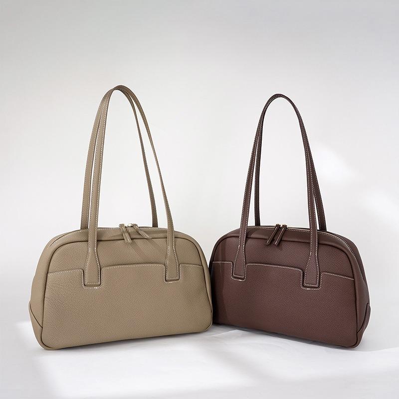 New leather women's bowling bag, fashionable commuter high-end large-capacity shoulder bag.