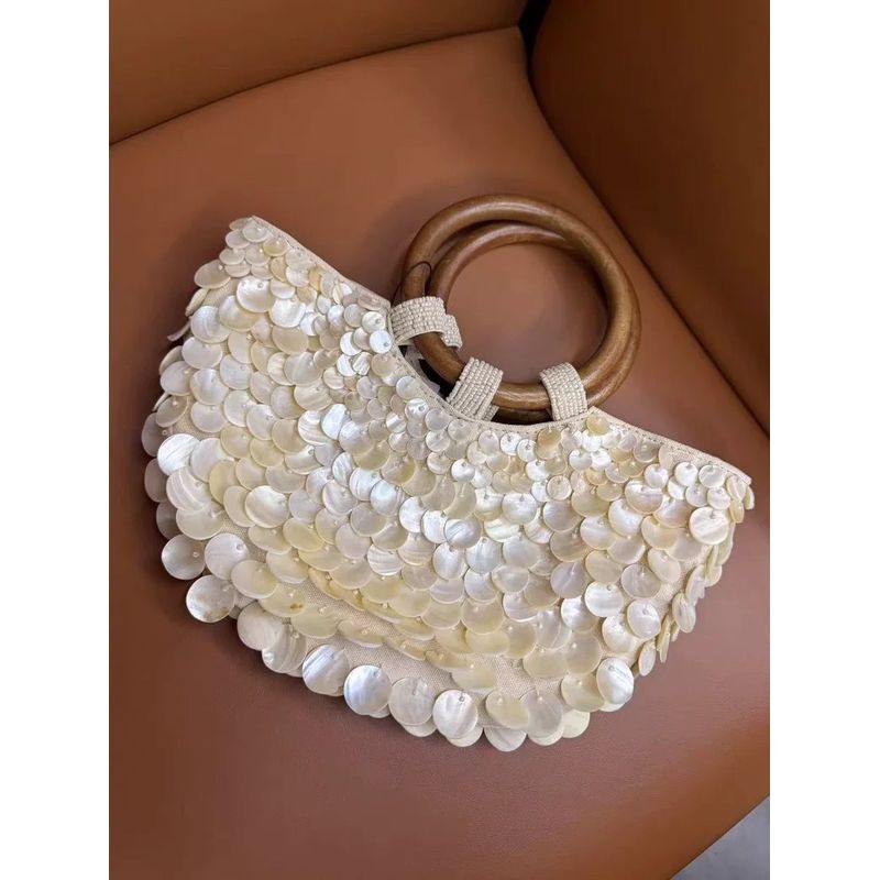 

2025 Summer New Style High Sense Handmade Natural Shell Bag Fairy Portable Women s Bag Niche Bag Personality Fashion Creamy-white shell bag