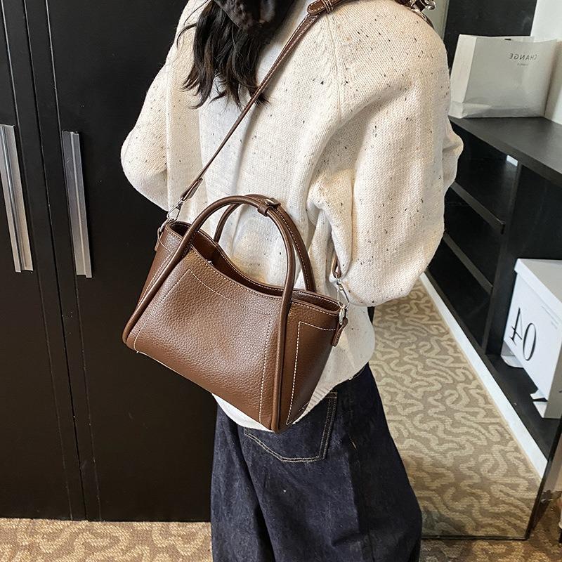 New large-capacity premium commuting PU shoulder handbag niche daily commuting soft leather wing bag women