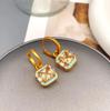 Qingdao Iridescent Geometric Wave Resin Stud Earrings: High-End Retro Fashion for Women