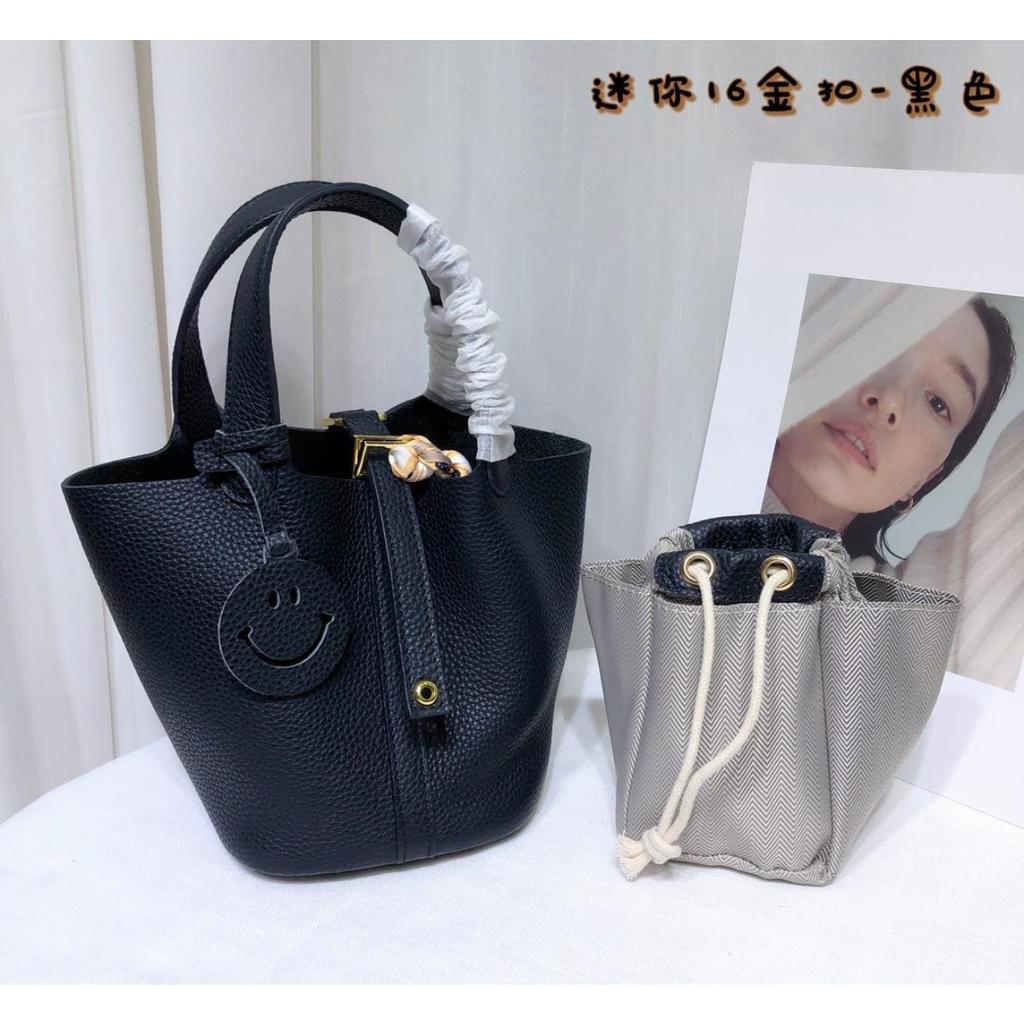 Spot wholesale top layer cowhide vegetable basket bag leather bucket bag commuter fashion lock buckle hand-held handbag woman
