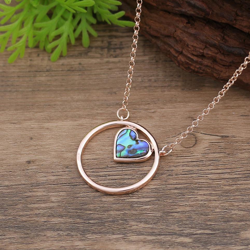

New hollow heart fritillary pendant, women s fashion high sense round hollow heart fritillary necklace