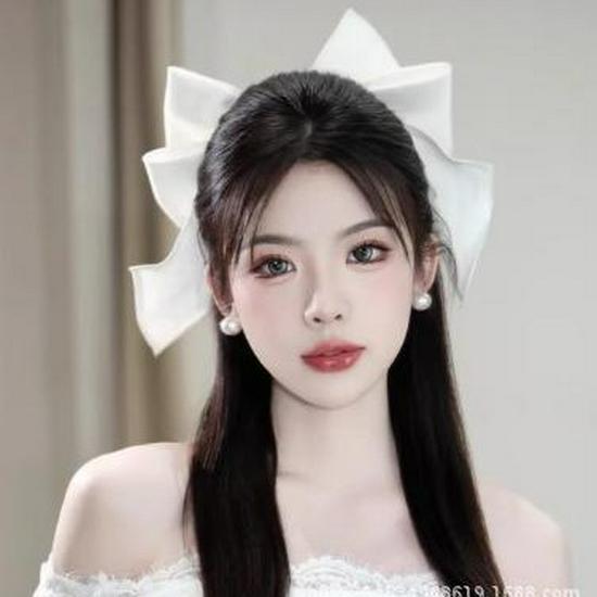 

Elegant Bridal White Satin Bow Hair Clip for Photography, Wedding, or Updo Accessory.