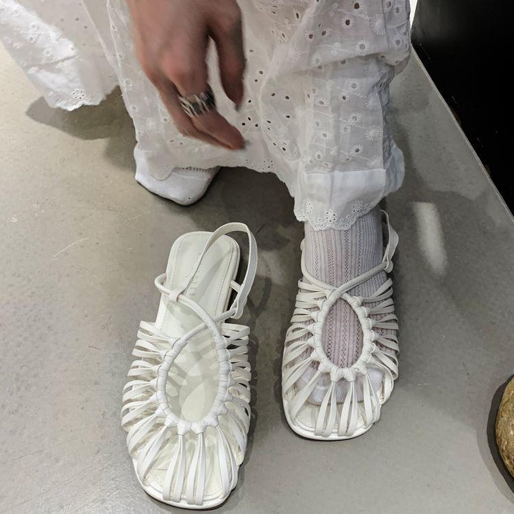 Baotou Roman sandals women's summer 2025 summer new French woven flat-bottomed pig cage shoes fairy strap soft sole