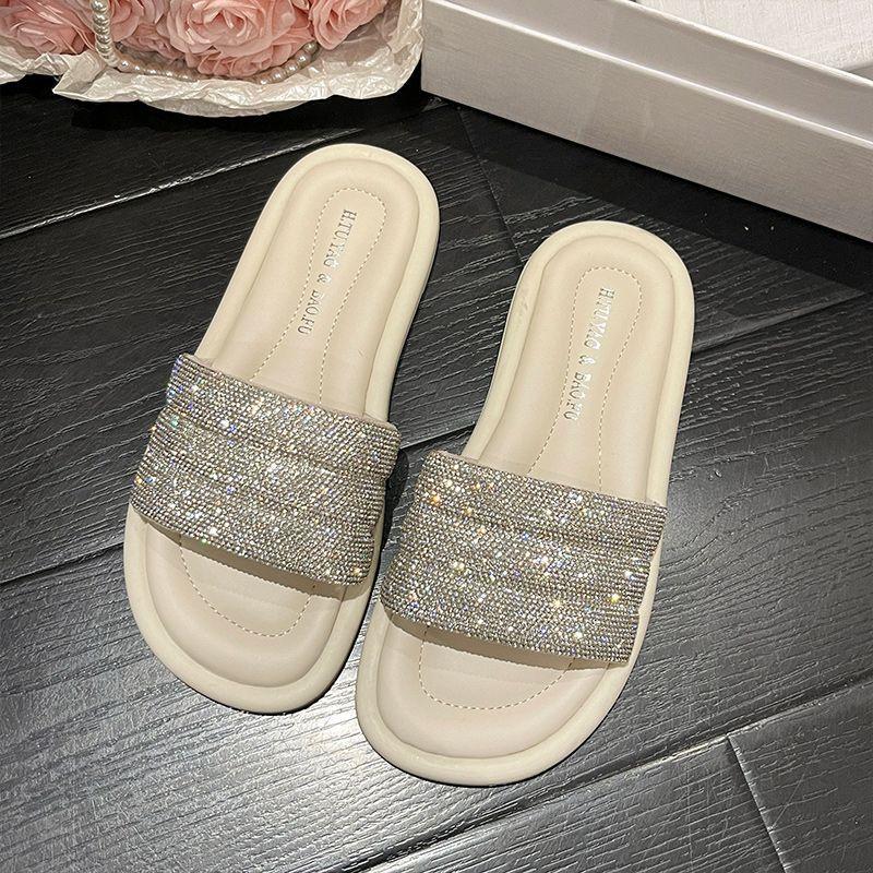 

Домашние универсальные крутые шлепанцы со стразами женские летние Нового года модные на плоской подошве с перемычкой 38 бежевый