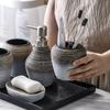 Badezimmer-Zubehör-Set mit Zahnbürstenbecher Mundspülbecher Lotionflaschen Seifenschale