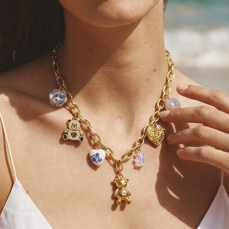 High-end light luxury ocean-style gold chain necklace for women, multiple pendants, shells, starfish, and bear fashion accessories