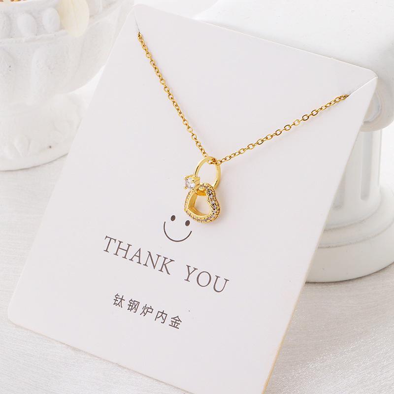 Versatile Luxury Titanium Steel Necklace with a Colorfast Pendant - Simple Niche Design Clavicle Chain for Women.