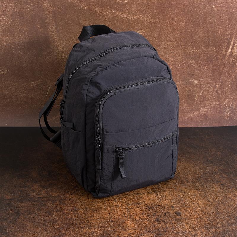 

Simple Backpack Small and Lightweight Travel Backpack Casual and Versatile Student Schoolbag чорний