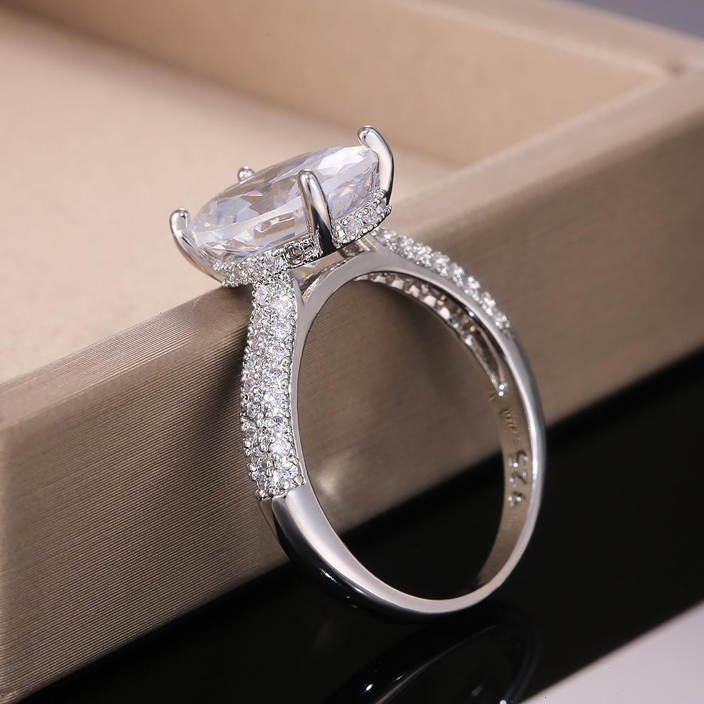 Ny Silverfärg Delikat Oval Cubic Zircon Stone Kvinnor Brudring för bröllop Förlovningsfest Bästa presenten till frun Klassiska ringar