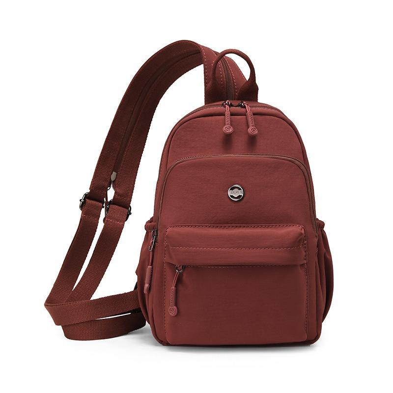 Рюкзак Женский Городской Легкий из Ткани Оксфорд Нишевый Новый Дорожный Рюкзак Большой Вместимости Повседневный Модный Рюкзак красный