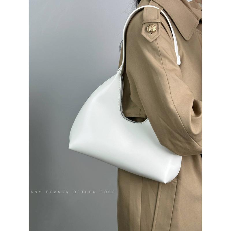 Korean niche baguette bag women's 2025 new crescent bag versatile single shoulder portable high-end fashion underarm bag