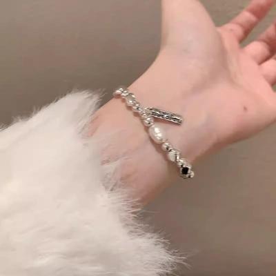 Irregular Pearl Tag Women's Bracelet - Light Luxury Elastic Rope with Exquisite Bead Design