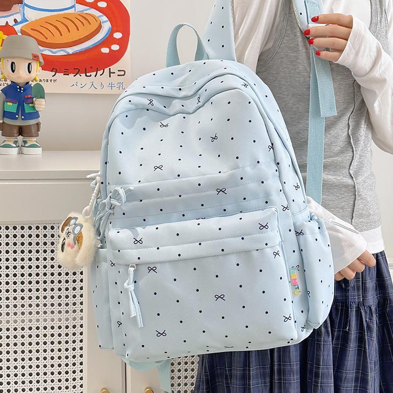 Schoolbag schoolbag junior high school girls girl heart polka dots bow versatile high value primary school backpack women 1011 new