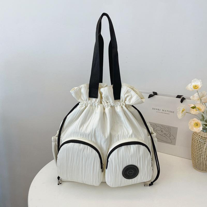 Рюкзак в академическом стиле высокая ценность большая вместимость женская новая нишевая плиссированная сумка на плечо с завязками 2980₽