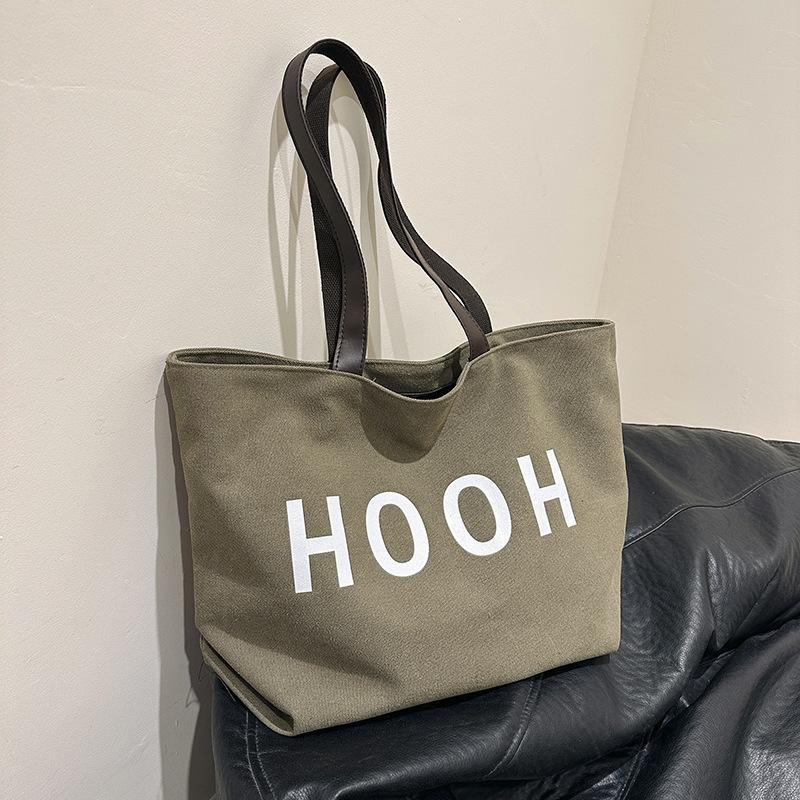 

2024 new ins canvas bag Japanese and Korean shoulder bag female high school college student tote bag textured armpit bag зелений