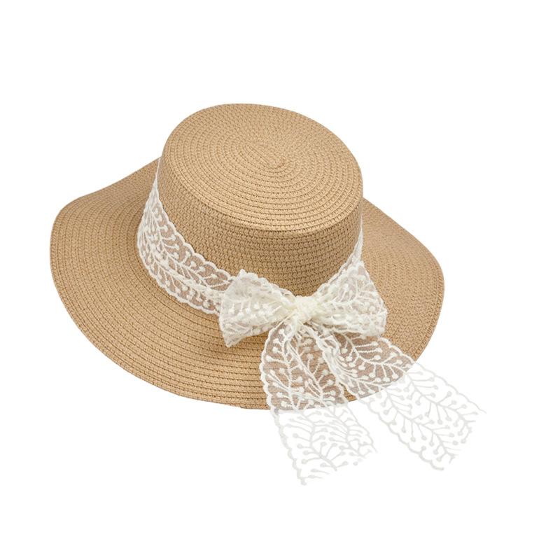 Idyllic straw hat summer seaside vacation sun protection sun hat children outdoor travel atmosphere sun hat