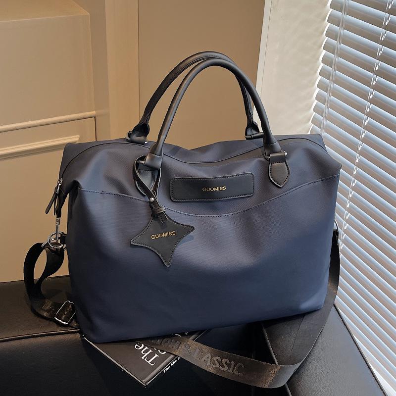 

Women s Large Capacity Waterproof Duffle Bag for Short Business Trips - Attachable To Suitcase, High-End Carry-On. 41cm x 21cm x 26cm синий