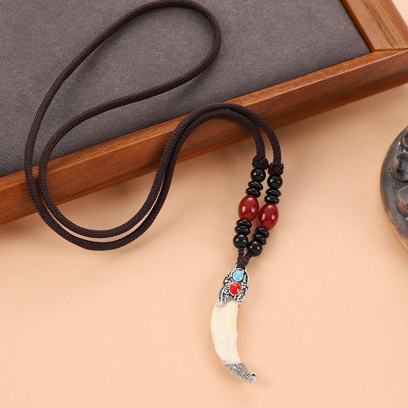 Retro woven dog tooth necklace men's and women's long niche personalized wolf tooth pendant pendant sweater chain accessories
