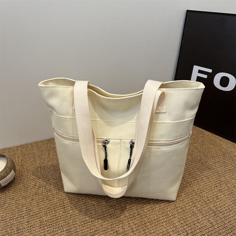 Spacious And Stylish Black Canvas Tote Bag For Women Perfect For Casual Everyday Use