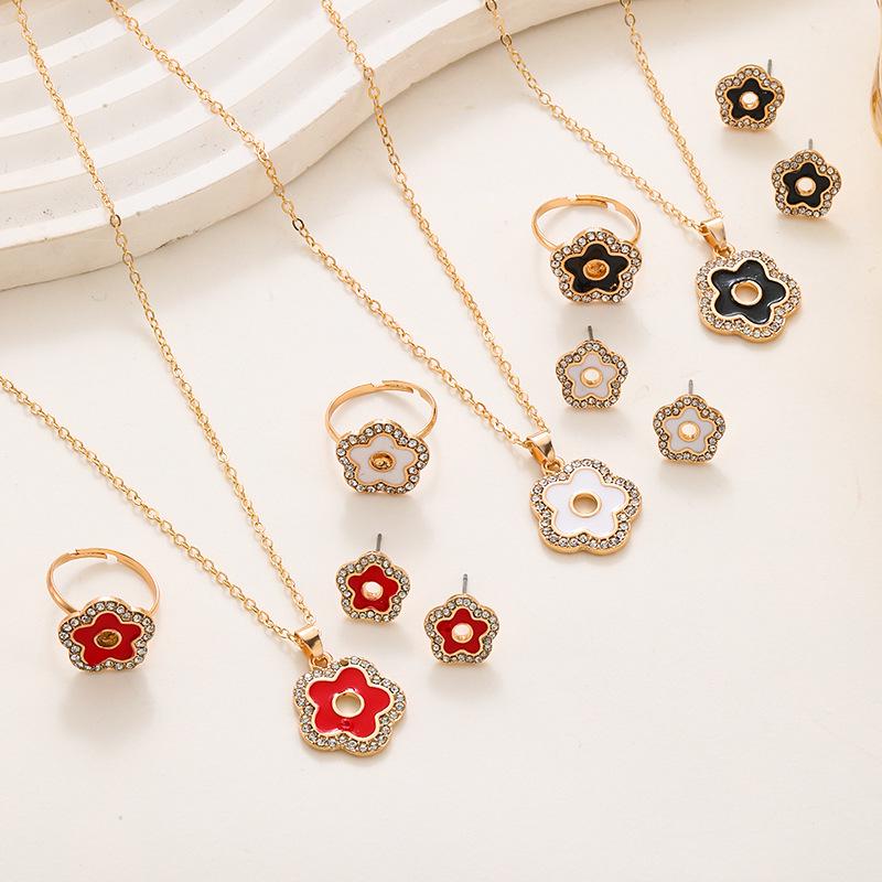 Women's Cold Style Jewelry Set: Diamond-Studded, Oil-Dripped Five-Leaf Clover & Hollow Star Necklace, Ring, Earrings