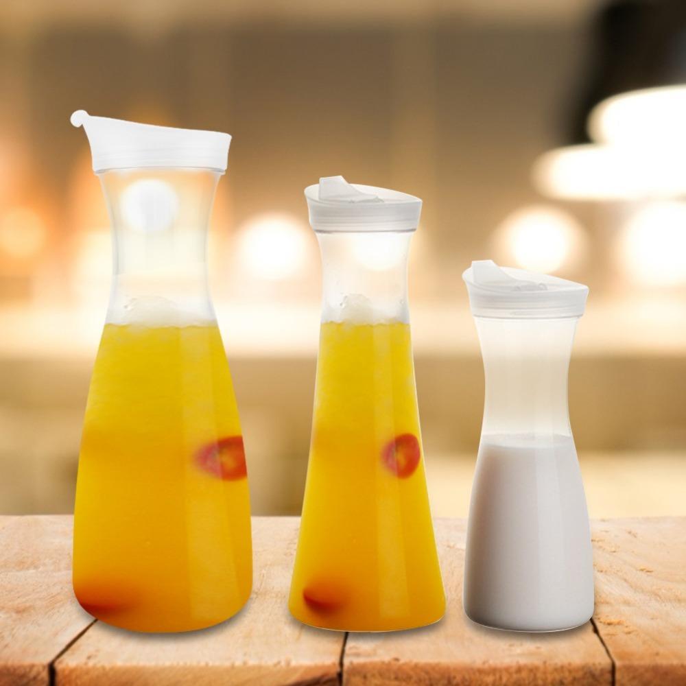 Transparent Water Pitcher Round Base Beverage Pitcher Reusable Transparent Juice Bottle Beverage 1100ml