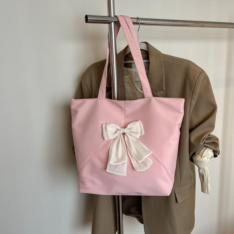 

Литературный нишевый дизайн, большая вместимость, персонализированная женская сумка через плечо для 2025 года, новая весенняя, для поездок на работу, студенческая сумка-тоут для занятий розовый