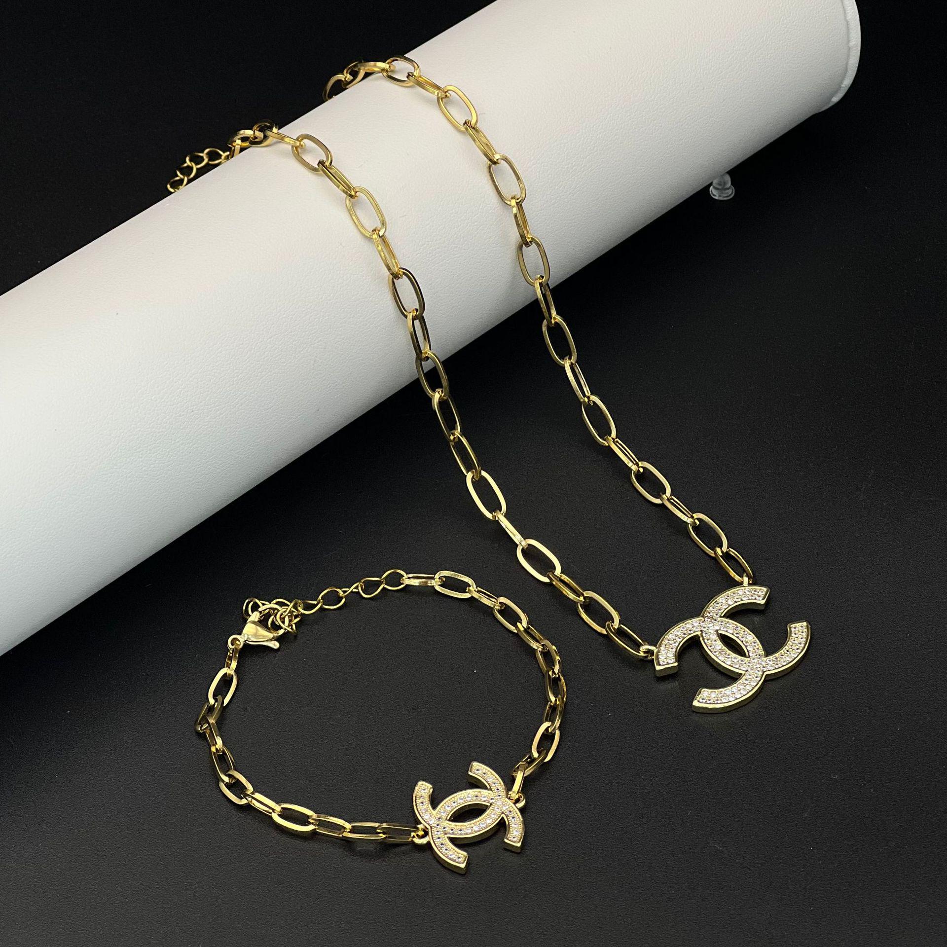 Ювелирный набор с цирконами, микро-паве: четырехлистный клевер и камелия: Браслет и ожерелье в стиле легкой роскоши