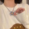 "European & American Double-Layer Love Necklace: Hip-Hop Inspired Long Sweater Chain for Women"