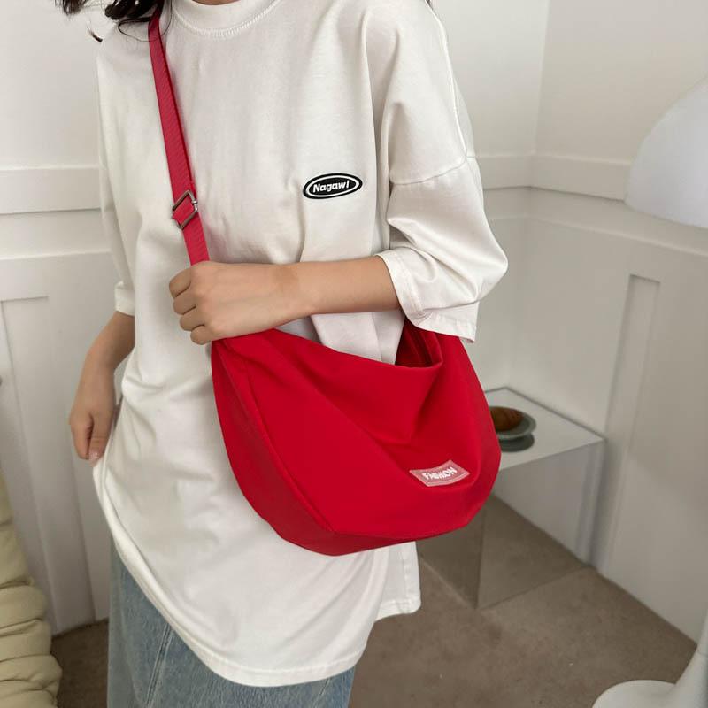 Fashionable And Minimalistic Dumpling Bag For Women Spacious Shoulder Bag Available In Black White Green Red Orange And Pink