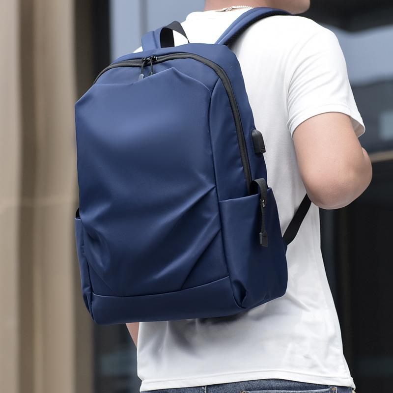 Nový unisexový jednobarevný voděodolný a prodyšný business fashion ležérní všestranný batoh na každý den