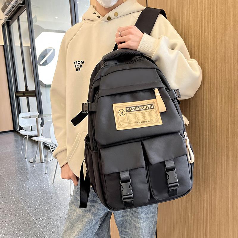 Fashionable casual large capacity multi-pocket labeling contrast color school bag for men and women students 23 autumn and winter new backpack
