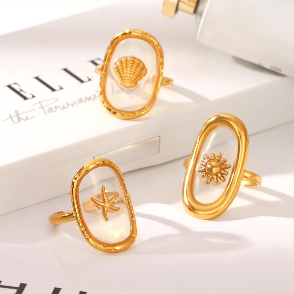 Starfish Epoxy Oval Ring: Adjustable Stainless Steel Finger Jewelry for Women In a Simple, Stylish Design.