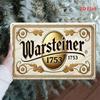 Warsteiner Öl Vintage Metallskylt i Elegant Väggkonst med Gyllene Svart Prydnadsdesign Perfekt för Hem Kök Bar