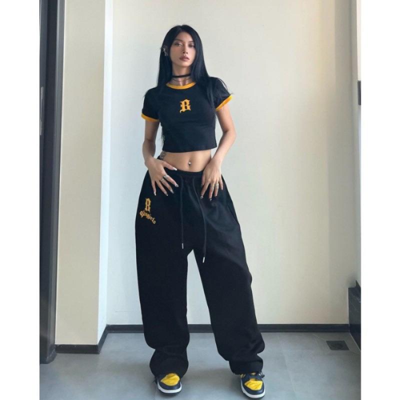 

Женские осенние спортивные штаны свободного кроя пикантного черного цвета - широкие брюки с манжетами для джазовых танцев Extra Large чёрный