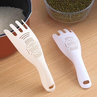 Multi-Function Rice Washing Spoon: Hand-Safe, Portable Filter, Drainer, Egg White Separator, Rice Spoon.