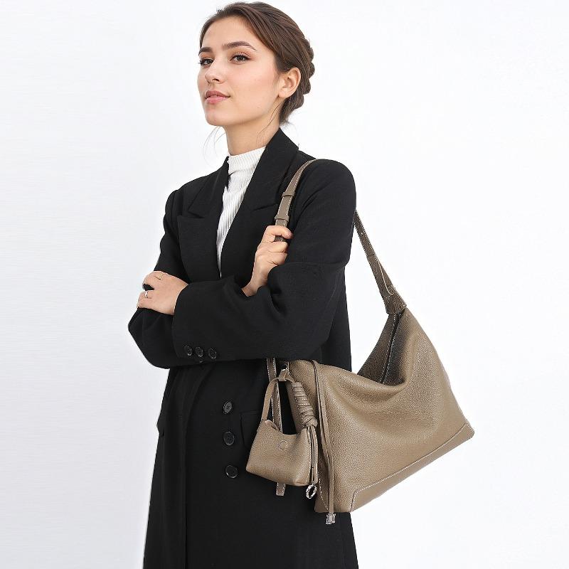 Nischen-Luxus-Einkaufstasche mit einer Schulter, unter dem Arm zu tragen, Crossbody-Tasche mit einem Gefühl von High-End, Echte Leder-Damenhandtasche