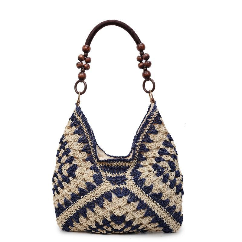 Hohle Stroh gewebte Tasche Damen neue Sommer Schulter Tragetasche Strandurlaub Strand gewebte Tasche