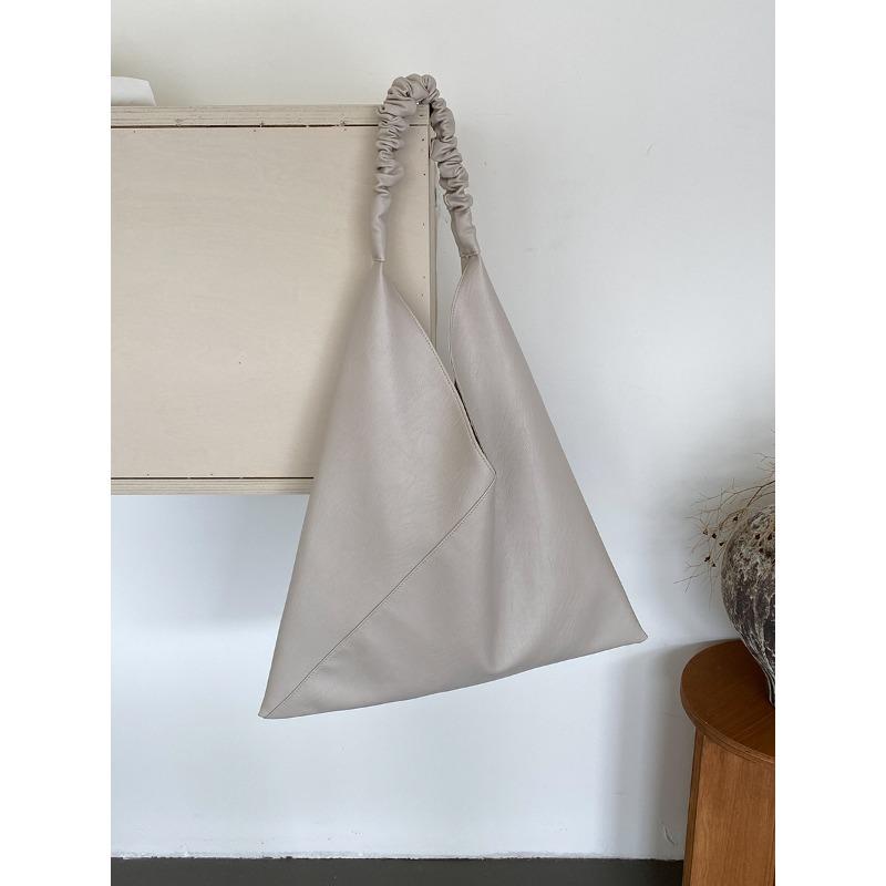 

Commuter style tote bag women s minimalist versatile large bag pleated design summer new shoulder bag women бежевый